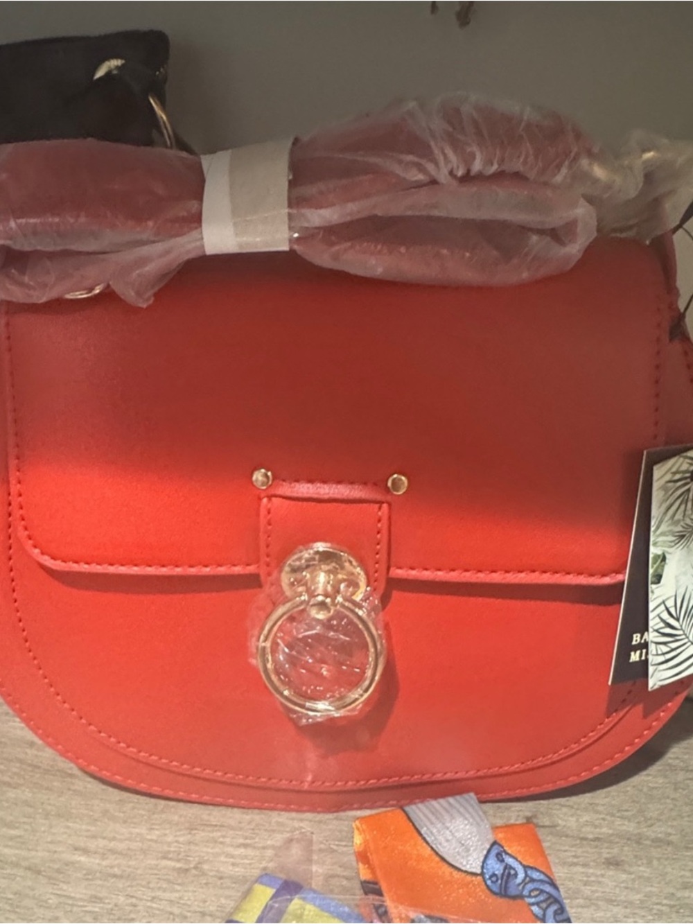 Red Structured Crossbody Bag with Gold Ring Accent